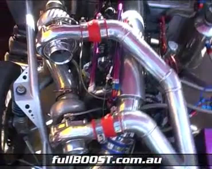 A four rotor rotary engine with twin turbos equals crazy fast