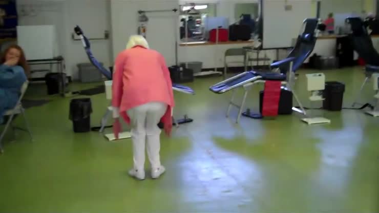 An old lady does a double back flip